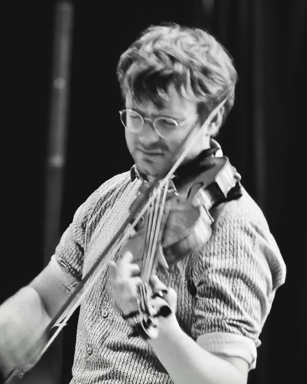 Tomas playing the violin
